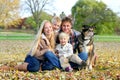 Happy Family and Pet Dog Autumn Portrait Royalty Free Stock Photo