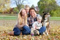 Happy Family and Pet Dog Autumn Portrait Royalty Free Stock Photo