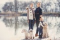 Happy family with Pets near the lake Royalty Free Stock Photo