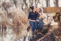 Happy family with Pets near the lake Royalty Free Stock Photo