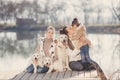 Happy family with Pets near the lake Royalty Free Stock Photo