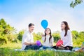 Happy family picnic. Asian parents Father, Mother and daughter playing the toy airplane and have enjoyed ourselves together