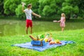 Happy family picnicking in the park