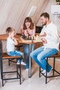 Happy family playing chess in the kitchen Royalty Free Stock Photo