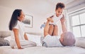 Happy family, playing and dad with child on bed, bonding and airplane game for father and daughter time in home. Parents Royalty Free Stock Photo