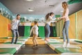 happy family playing and jumping together Royalty Free Stock Photo