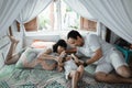 Happy family playing together on the bed Royalty Free Stock Photo