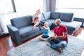 Happy family playing a video game Royalty Free Stock Photo