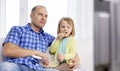 Happy family with popcorn watching tv at home Royalty Free Stock Photo