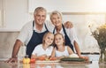 Happy family, portrait and grandparents with grandkids cooking in a kitchen with vegetables. Food, learning and face of