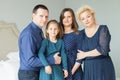 Happy family portrait. Mother, daughter, father and grandmother Royalty Free Stock Photo