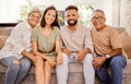 Happy family, portrait and relax on sofa happy, smile and bond in living room together. Senior couple, retirement and Royalty Free Stock Photo