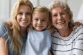 Happy family portrait of three generations of women Royalty Free Stock Photo