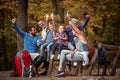 A happy family posing for a photo on a break of hiking in the forest Royalty Free Stock Photo