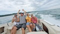 Happy family in power boat