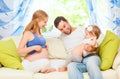 happy family. pregnant mother, father, and child daughter at home Royalty Free Stock Photo