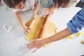 Happy family preparation holiday food concept. Family cooking Christmas cookies. Hands of mother and daughter preparing