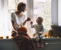 Happy family preparing for Halloween at home together Royalty Free Stock Photo