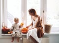 Happy family preparing for Halloween at home together Royalty Free Stock Photo