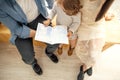 Happy family reading a book to her daughter. Mothers Day Royalty Free Stock Photo