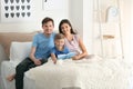 Happy family reading book together at home Royalty Free Stock Photo