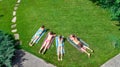 Happy family relaxing by swimming pool, aerial drone view from above of parents and kids have fun on vacation, family weekend Royalty Free Stock Photo