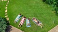 Happy family relaxing by swimming pool, aerial drone view from above of parents and kids have fun on vacation, family weekend Royalty Free Stock Photo