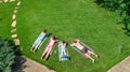 Happy family relaxing by swimming pool, aerial drone view from above of parents and kids have fun on vacation, family weekend Royalty Free Stock Photo