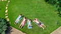 Happy family relaxing by swimming pool, aerial drone view from above of parents and kids have fun on vacation, family weekend Royalty Free Stock Photo