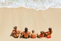 Happy family relaxing on white sand sea beach Royalty Free Stock Photo