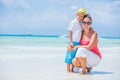 Happy family resting at beach in summer. Mother with boy resting on the beach. Young mother and her adorable little son Royalty Free Stock Photo