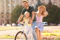 Happy family riding bicycle outdoors Royalty Free Stock Photo