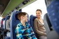 Happy family riding in travel bus Royalty Free Stock Photo