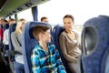 Happy family riding in travel bus Royalty Free Stock Photo