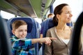 Happy family riding in travel bus Royalty Free Stock Photo