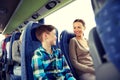 Happy family riding in travel bus Royalty Free Stock Photo