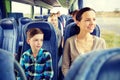 Happy family riding in travel bus Royalty Free Stock Photo