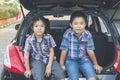 Happy family on a road trip, Sitting In Trunk Of Car Royalty Free Stock Photo