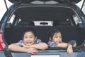 Happy family on a road trip, Sitting In Trunk Of Car Royalty Free Stock Photo