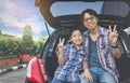 Happy family on a road trip, Sitting In Trunk Of Car Royalty Free Stock Photo