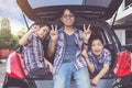 Happy family on a road trip, Sitting In Trunk Of Car Royalty Free Stock Photo