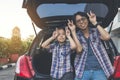 Happy family on a road trip, Sitting In Trunk Of Car Royalty Free Stock Photo