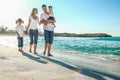 Happy family by the sea in the open air Royalty Free Stock Photo