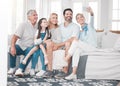 Happy family, selfie and girl relax with parents, grandparents and smartphone on sofa in a living room, happy and