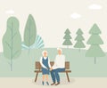 Happy family seniors: cute smiling elderly man and woman hold hands and sit on bench in park. Retired elderly couple in love.Trees