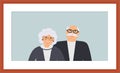 Happy family seniors portrait: cute smiling elderly man and woman on the light blue background in the wooden brown frame. Retired Royalty Free Stock Photo