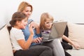 Happy family shopping online concept using laptop and credit car Royalty Free Stock Photo