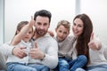 Happy family showing thumbs up. Royalty Free Stock Photo