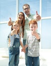 Happy family showing thumbs up Royalty Free Stock Photo