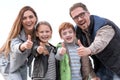 Happy family showing thumbs up Royalty Free Stock Photo